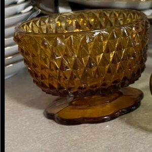 Bundle of glass candle/oil  holder . Amber is vintage and thick glass . 2 green